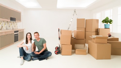 Furniture and boxes being loaded for small removals in North Finchley